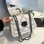 Bolso de Cuero Mary | Cadena Convertible y Relieve Tridimensional